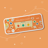 Orange tin packaging for feelings chart, showing the wooden stand and emotion tokens.