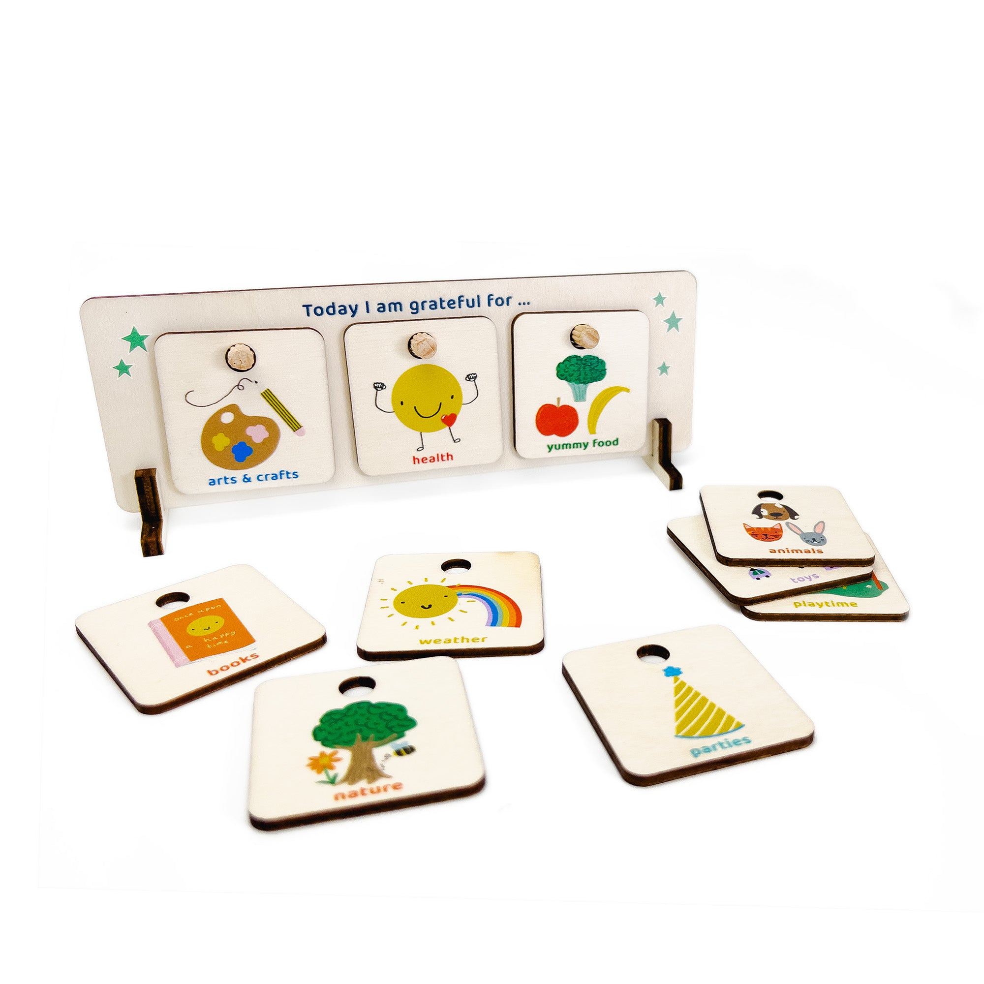 Wooden gratitude chart with three tokens slotted in and additional illustrated tokens displayed around it.