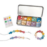 Half completed bracelets made from the kit, showcasing vibrant beads and smiley face charms.
