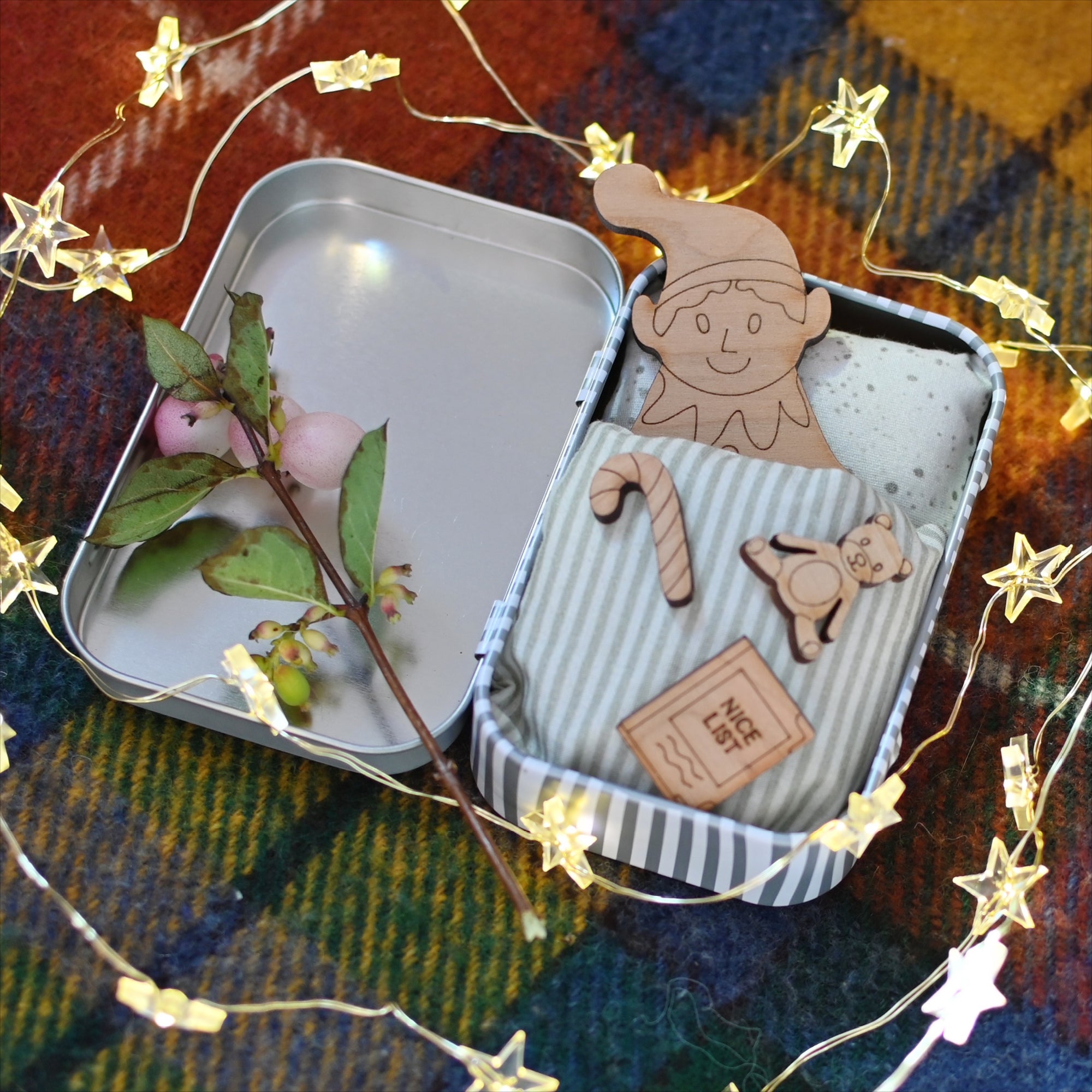 wooden elf in gift tin